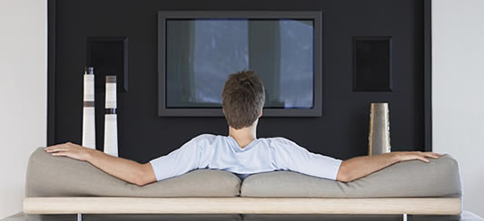 relaxing on man cave couch